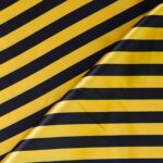 Tessuto Raso Stampato Fantasia - Rigato Nero fondo Giallo