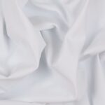 Tessuto Lycra Opaca. Si tratta di un materiale creato apposta per aderire alla figura corporea. Elastico e allungabile è dunque molto usato nel mondo dello sport