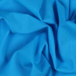 Tessuto Lycra Opaca. Si tratta di un materiale creato apposta per aderire alla figura corporea. Elastico e allungabile è dunque molto usato nel mondo dello sport
