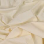 Tessuto Lycra Opaca. Si tratta di un materiale creato apposta per aderire alla figura corporea. Elastico e allungabile è dunque molto usato nel mondo dello sport