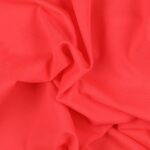 Tessuto Lycra Opaca. Si tratta di un materiale creato apposta per aderire alla figura corporea. Elastico e allungabile è dunque molto usato nel mondo dello sport