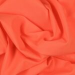 Tessuto Lycra Opaca. Si tratta di un materiale creato apposta per aderire alla figura corporea. Elastico e allungabile è dunque molto usato nel mondo dello sport