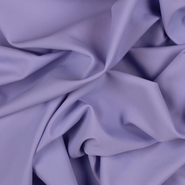 Tessuto Lycra Opaca. Si tratta di un materiale creato apposta per aderire alla figura corporea. Elastico e allungabile è dunque molto usato nel mondo dello sport