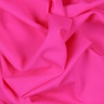 Tessuto Lycra Opaca. Si tratta di un materiale creato apposta per aderire alla figura corporea. Elastico e allungabile è dunque molto usato nel mondo dello sport