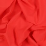 Tessuto Lycra Opaca. Si tratta di un materiale creato apposta per aderire alla figura corporea. Elastico e allungabile è dunque molto usato nel mondo dello sport