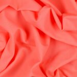 Tessuto Lycra Opaca. Si tratta di un materiale creato apposta per aderire alla figura corporea. Elastico e allungabile è dunque molto usato nel mondo dello sport