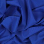 Tessuto Lycra Opaca. Si tratta di un materiale creato apposta per aderire alla figura corporea. Elastico e allungabile è dunque molto usato nel mondo dello sport