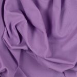 Tessuto Lycra Opaca. Si tratta di un materiale creato apposta per aderire alla figura corporea. Elastico e allungabile è dunque molto usato nel mondo dello sport