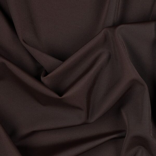 Tessuto Lycra Opaca. Si tratta di un materiale creato apposta per aderire alla figura corporea. Elastico e allungabile è dunque molto usato nel mondo dello sport