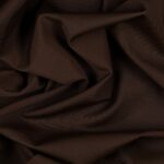 Tessuto Lycra Opaca. Si tratta di un materiale creato apposta per aderire alla figura corporea. Elastico e allungabile è dunque molto usato nel mondo dello sport