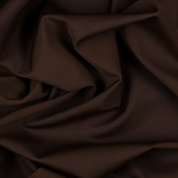 Tessuto Lycra Opaca. Si tratta di un materiale creato apposta per aderire alla figura corporea. Elastico e allungabile è dunque molto usato nel mondo dello sport