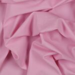 Tessuto Lycra Opaca. Si tratta di un materiale creato apposta per aderire alla figura corporea. Elastico e allungabile è dunque molto usato nel mondo dello sport