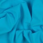 Tessuto Lycra Opaca. Si tratta di un materiale creato apposta per aderire alla figura corporea. Elastico e allungabile è dunque molto usato nel mondo dello sport