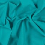 Tessuto Lycra Opaca. Si tratta di un materiale creato apposta per aderire alla figura corporea. Elastico e allungabile è dunque molto usato nel mondo dello sport