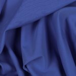 Tessuto Lycra Opaca. Si tratta di un materiale creato apposta per aderire alla figura corporea. Elastico e allungabile è dunque molto usato nel mondo dello sport