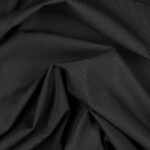 Tessuto Lycra Opaca. Si tratta di un materiale creato apposta per aderire alla figura corporea. Elastico e allungabile è dunque molto usato nel mondo dello sport