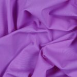 Tessuto Lycra Opaca. Si tratta di un materiale creato apposta per aderire alla figura corporea. Elastico e allungabile è dunque molto usato nel mondo dello sport