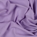 Tessuto Lycra Opaca. Si tratta di un materiale creato apposta per aderire alla figura corporea. Elastico e allungabile è dunque molto usato nel mondo dello sport