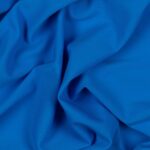 Tessuto Lycra Opaca. Si tratta di un materiale creato apposta per aderire alla figura corporea. Elastico e allungabile è dunque molto usato nel mondo dello sport