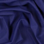 Tessuto Lycra Opaca. Si tratta di un materiale creato apposta per aderire alla figura corporea. Elastico e allungabile è dunque molto usato nel mondo dello sport