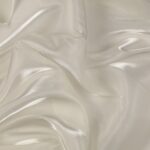 Dettaglio organza lucida bianco seta - trasparenza e riflessi