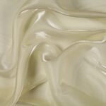 Dettaglio organza lucida panna - trasparenza e riflessi
