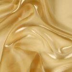 Dettaglio organza lucida oro chiaro - trasparenza e riflessi