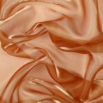 Dettaglio organza lucida bronzo - trasparenza e riflessi