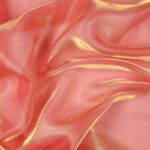 Dettaglio organza lucida salmone riflesso oro - trasparenza e riflessi