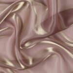 Dettaglio organza lucida rosato riflesso oro - trasparenza e riflessi