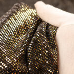 Paillettes Elastica Cerchio - al Metro - Nero Paillettes Oro